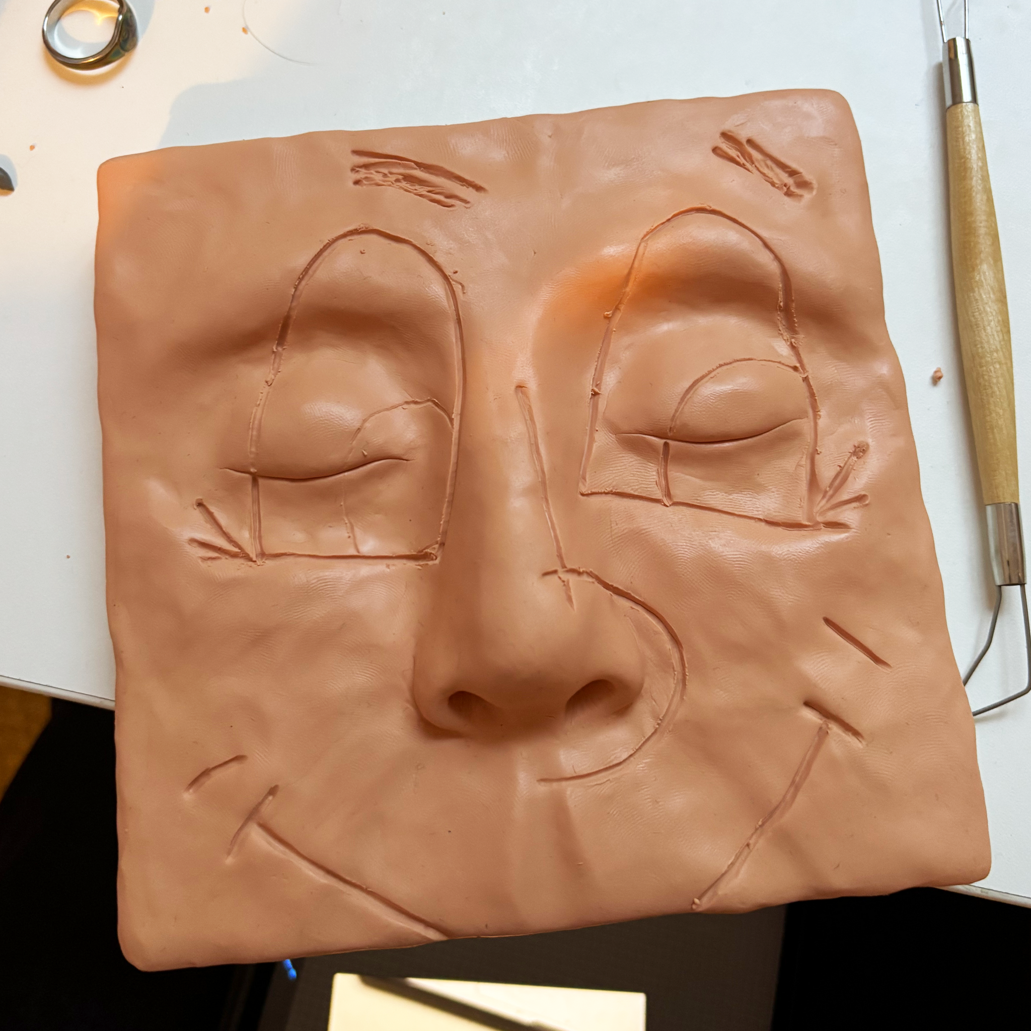 'Face Tattoo' by Evan Hudson